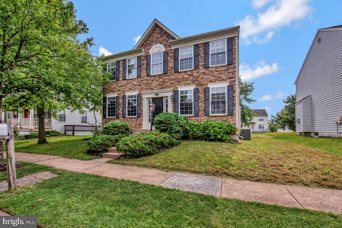1329 Canberra Drive Baltimore, MD 21221 - Photo 1 of 43 a front view of a house with garden
