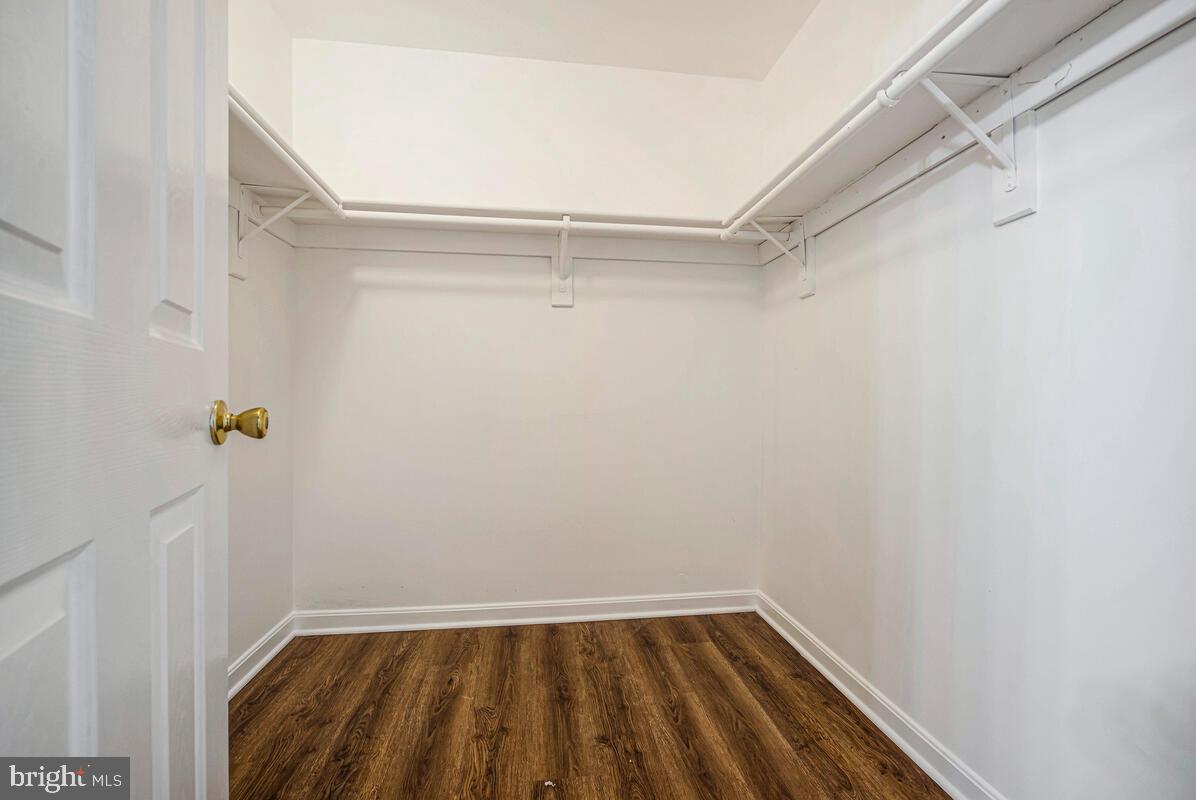 1329 Canberra Drive Baltimore, MD 21221 - Photo 31 of 43 a view of walk in closet with empty racks