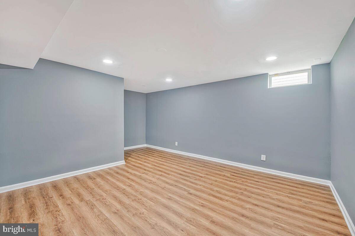 1329 Canberra Drive Baltimore, MD 21221 - Photo 35 of 43 a view of room with wooden floor