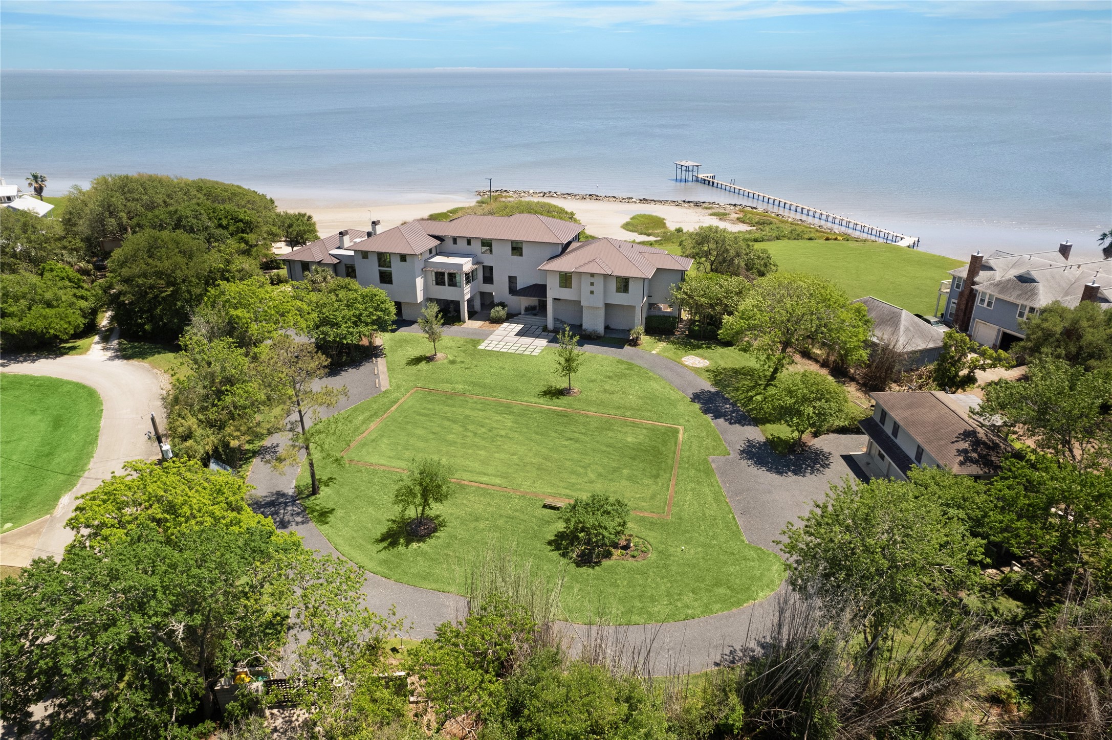 a swimming pool with outdoor seating and yard
