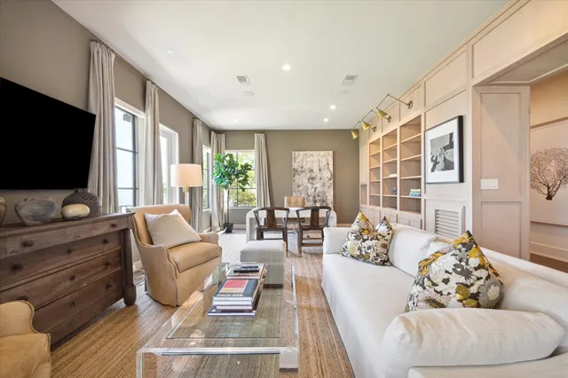 a large bedroom with a large bed and a window