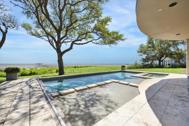 a view of a lake with a city