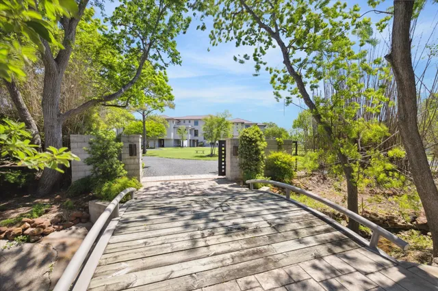 an aerial view of a house with a garden