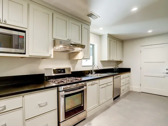 a view of a ocean beach with outdoor seating
