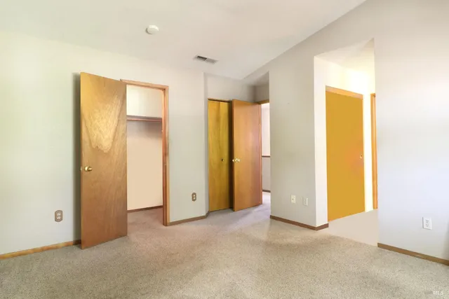 a view of an empty room with window