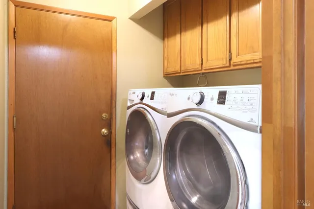 a view of a backyard with tree