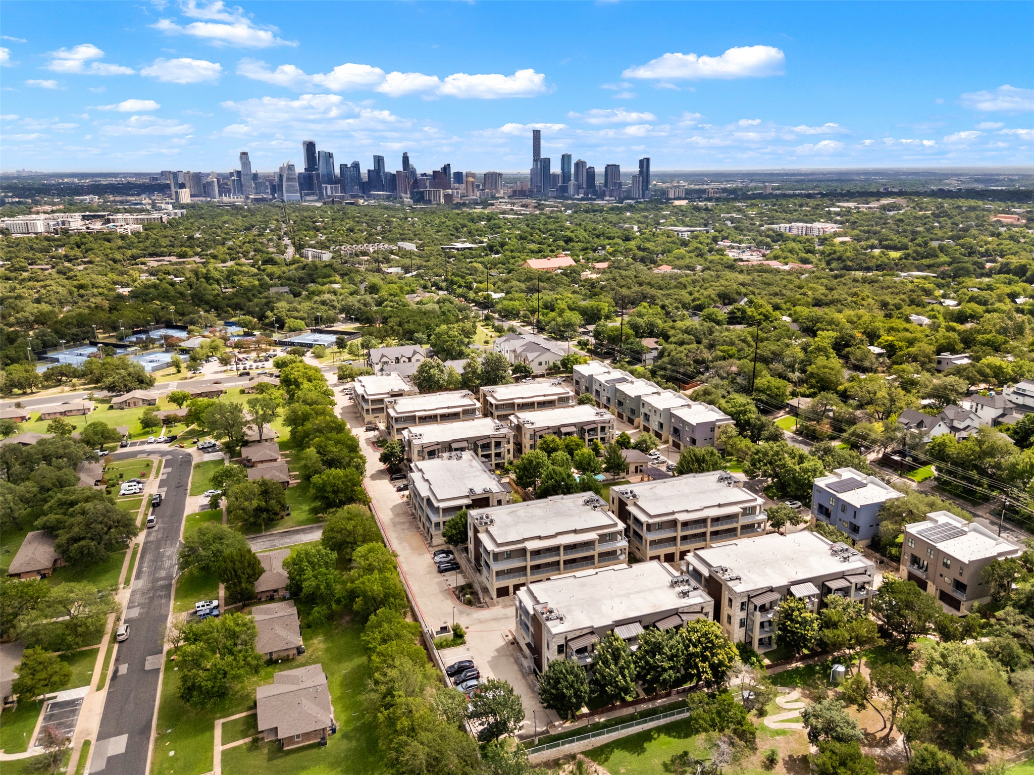 2804 Treble Lane, Unit 902 Austin, TX 78704 - Photo 30 of 31 an aerial view of residential building with parking space