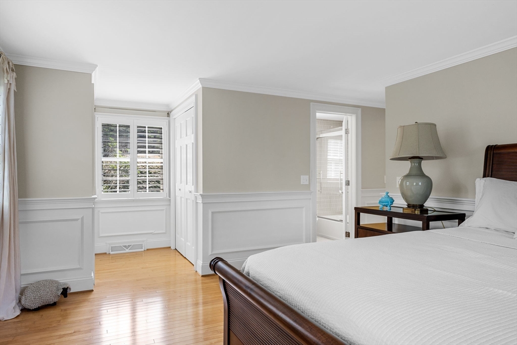 56 Riverview Drive Chatham, MA 02633 - Photo 23 of 37 a bedroom with a bed and a window