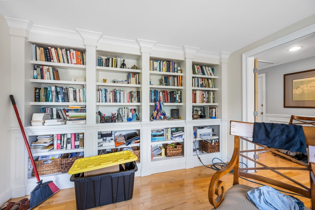 56 Riverview Drive Chatham, MA 02633 - Photo 27 of 37 a room with furniture and a book shelf
