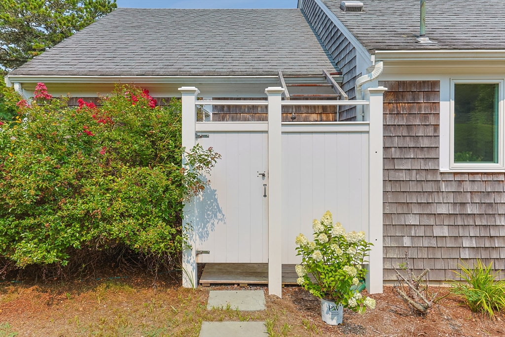 56 Riverview Drive Chatham, MA 02633 - Photo 33 of 37 a front view of a house with plants