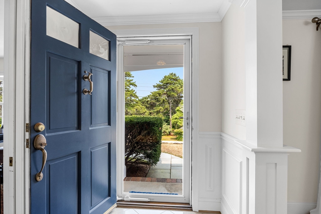 56 Riverview Drive Chatham, MA 02633 - Photo 4 of 37 a view of a porch of a house