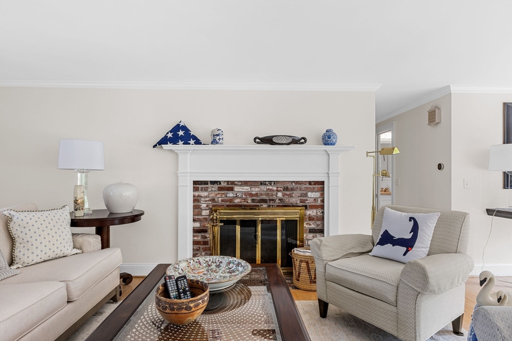 56 Riverview Drive Chatham, MA 02633 - Photo 6 of 37 a living room with furniture and a fireplace