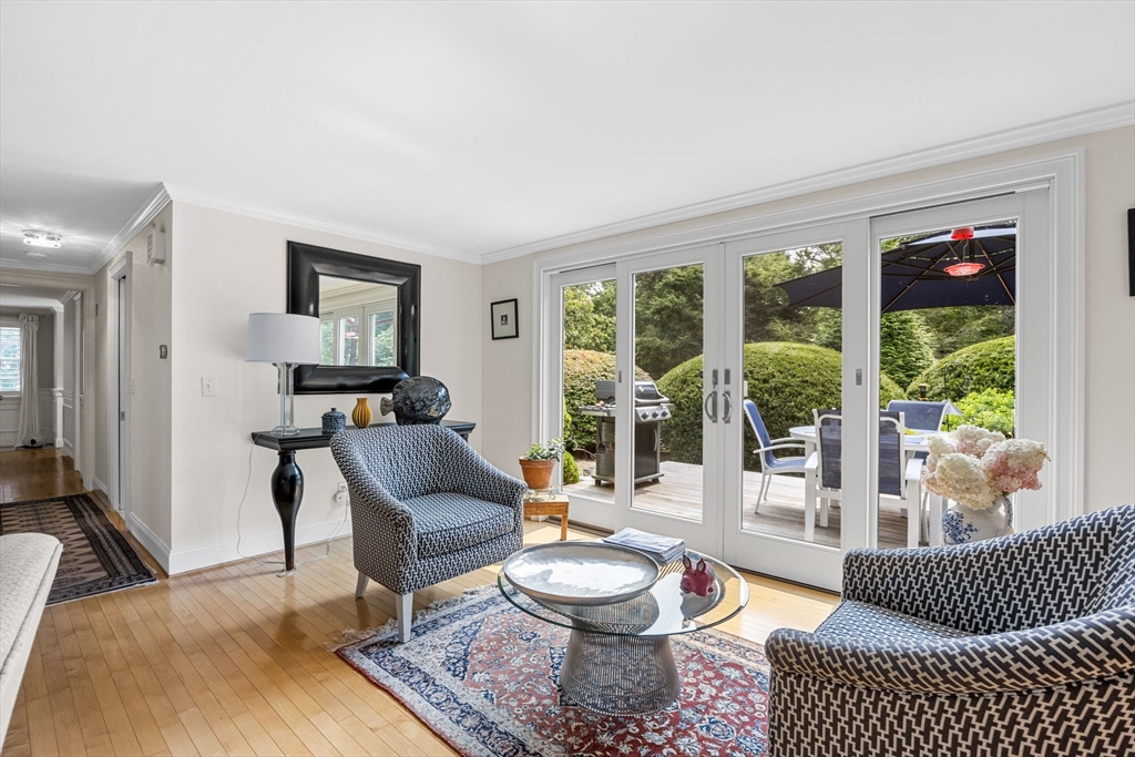 56 Riverview Drive Chatham, MA 02633 - Photo 8 of 37 a living room with furniture and a rug