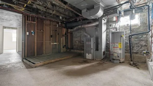 an empty room with a empty space and a ceiling fan