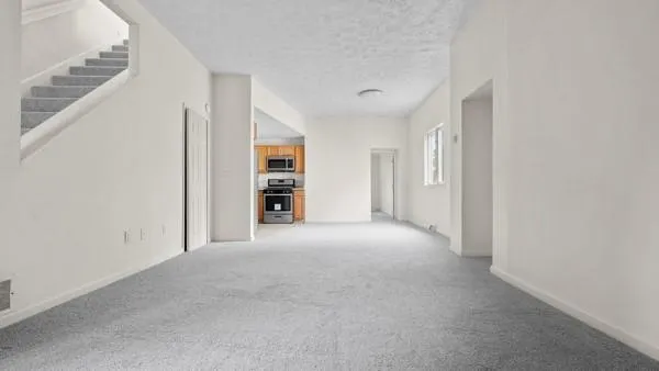 a view of a big room with closet and cabinet
