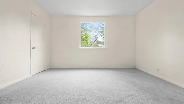 an empty room with a window