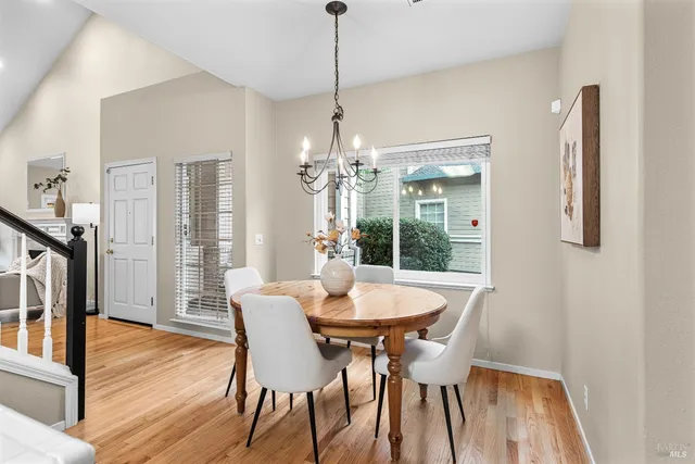 a view of a hallway with bathroom