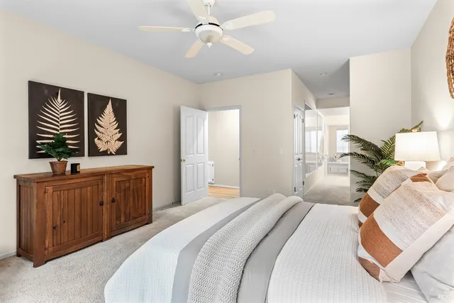 a bathroom with a sink a tub and a mirror