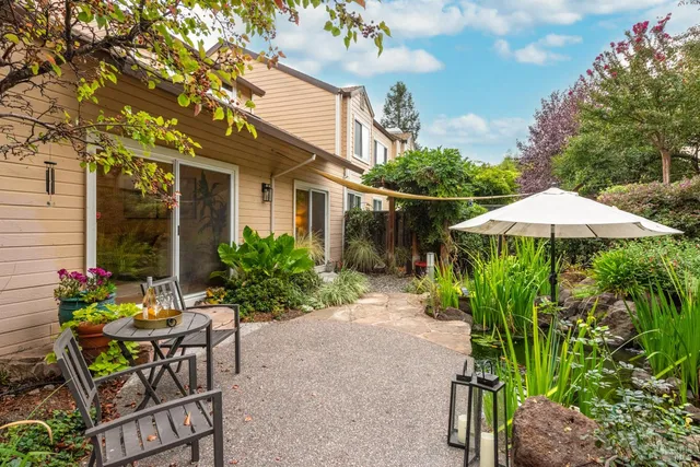 a view of a swimming pool with a patio