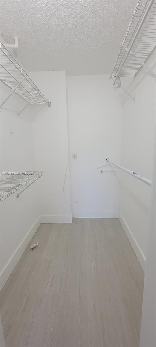 8323 Lake Drive, Unit 404 Doral, FL 33166 - Photo 5 of 11 a view of an empty room