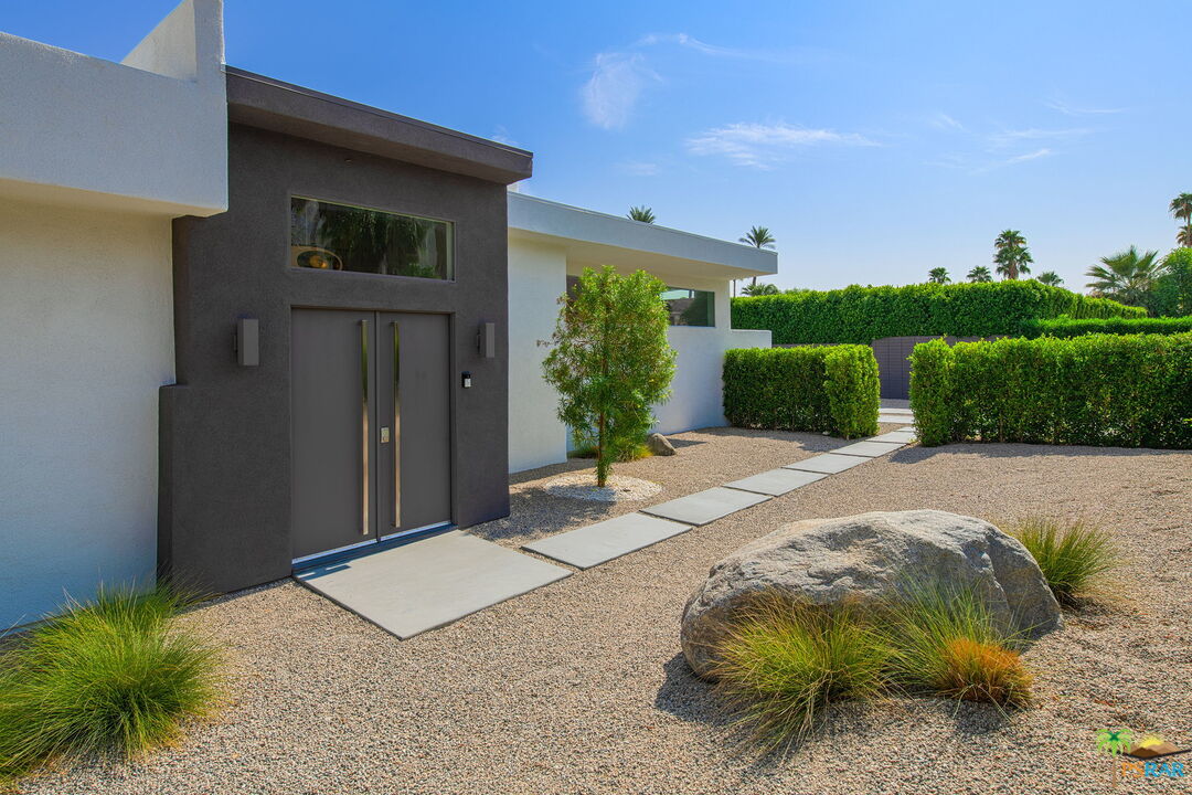 71460 San Gorgonio Road Rancho Mirage, CA 92270 - Photo 1 of 1 a backyard of a house with plants and outdoor space