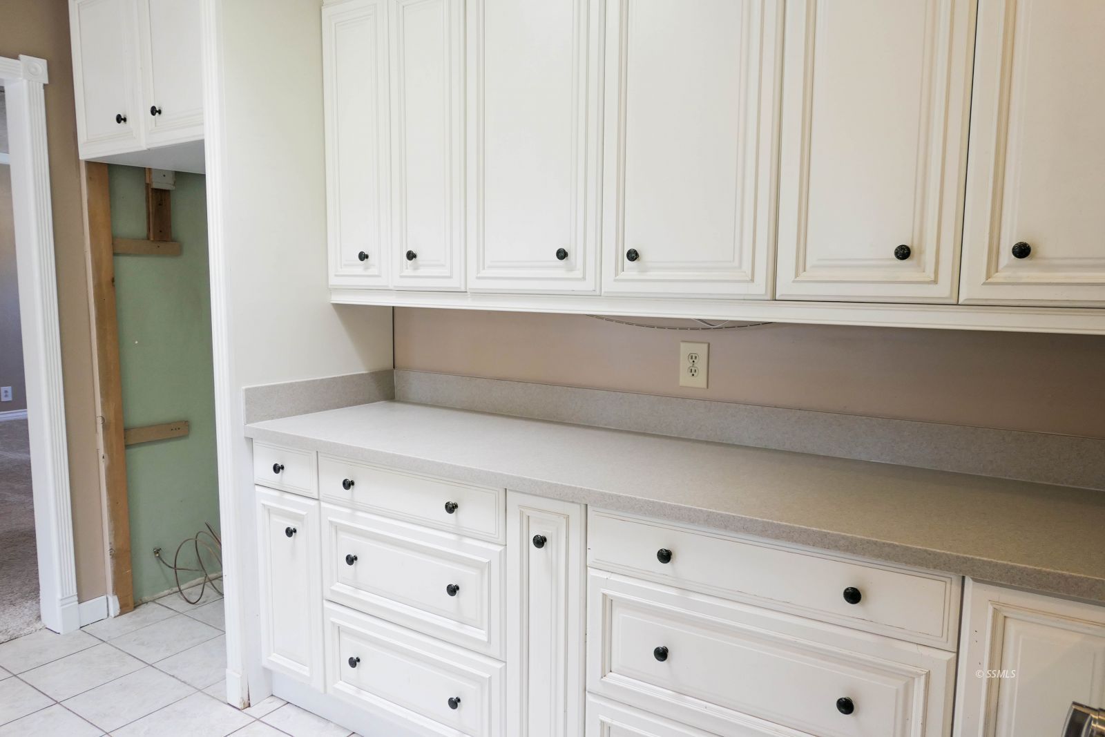420 North Fairview Street Ridgecrest, CA 93555 - Photo 17 of 48 a view of white cabinets and window