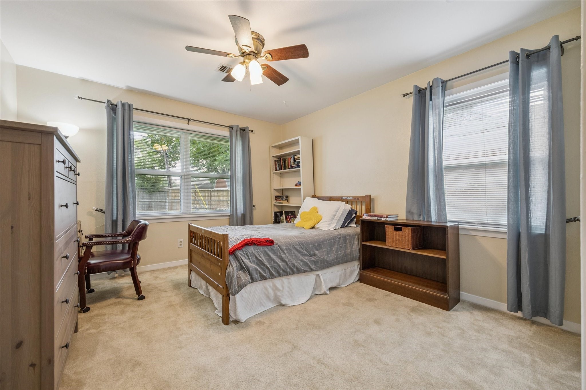 5114 Kinglet Street Houston, TX 77035 - Photo 16 of 20 a living room with furniture and a window