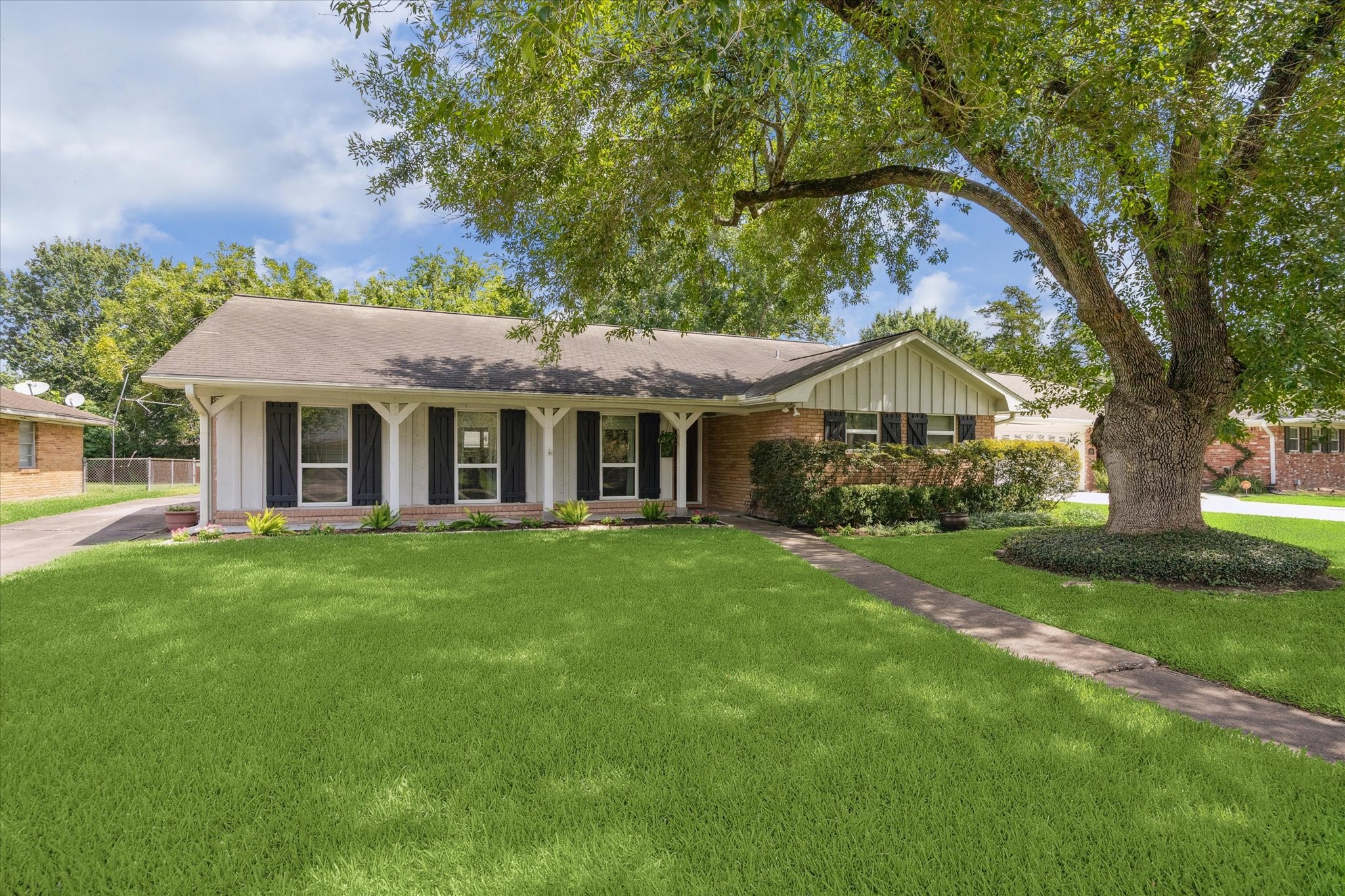 5114 Kinglet Street Houston, TX 77035 - Photo 2 of 20 a front view of a house with a yard