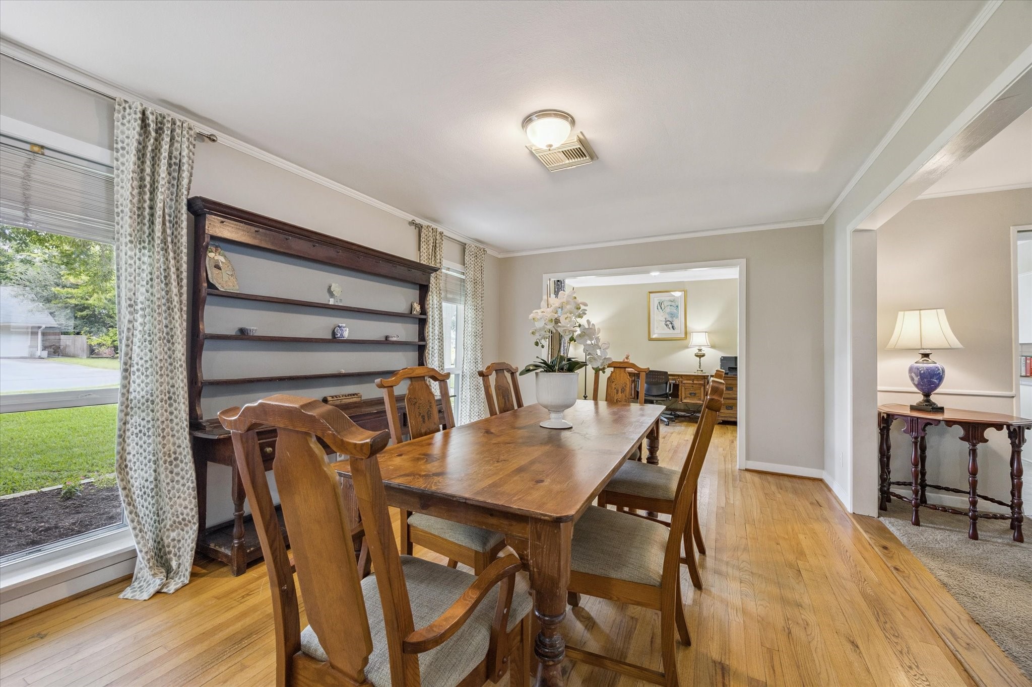 5114 Kinglet Street Houston, TX 77035 - Photo 4 of 20 a view of a dining room with furniture and wooden floor