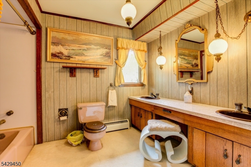 49 Frog Hollow Road Califon, NJ 07830 - Photo 19 of 28 a bathroom with a sink a toilet and shower