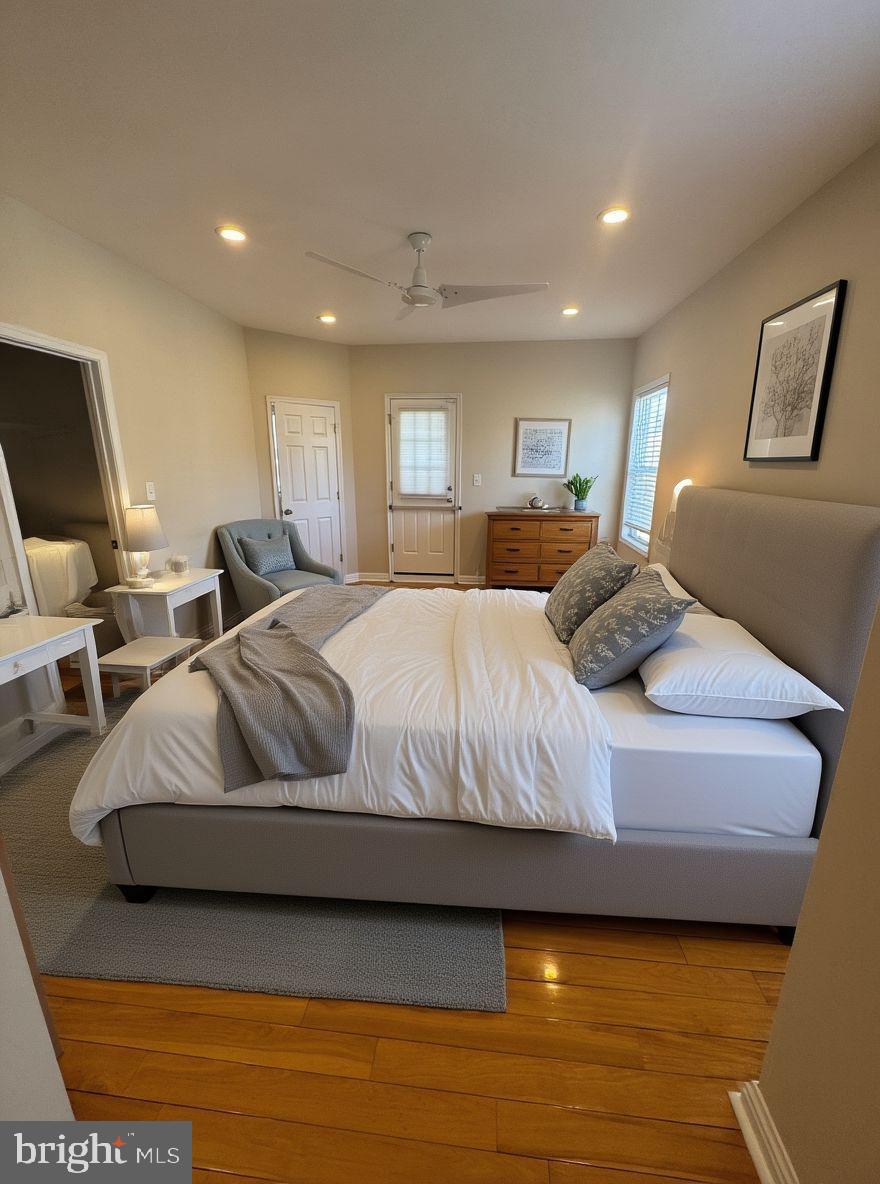 2239 Ridge Place Southeast Washington, DC 20020 - Photo 21 of 44 a bedroom with a bed and a night stand