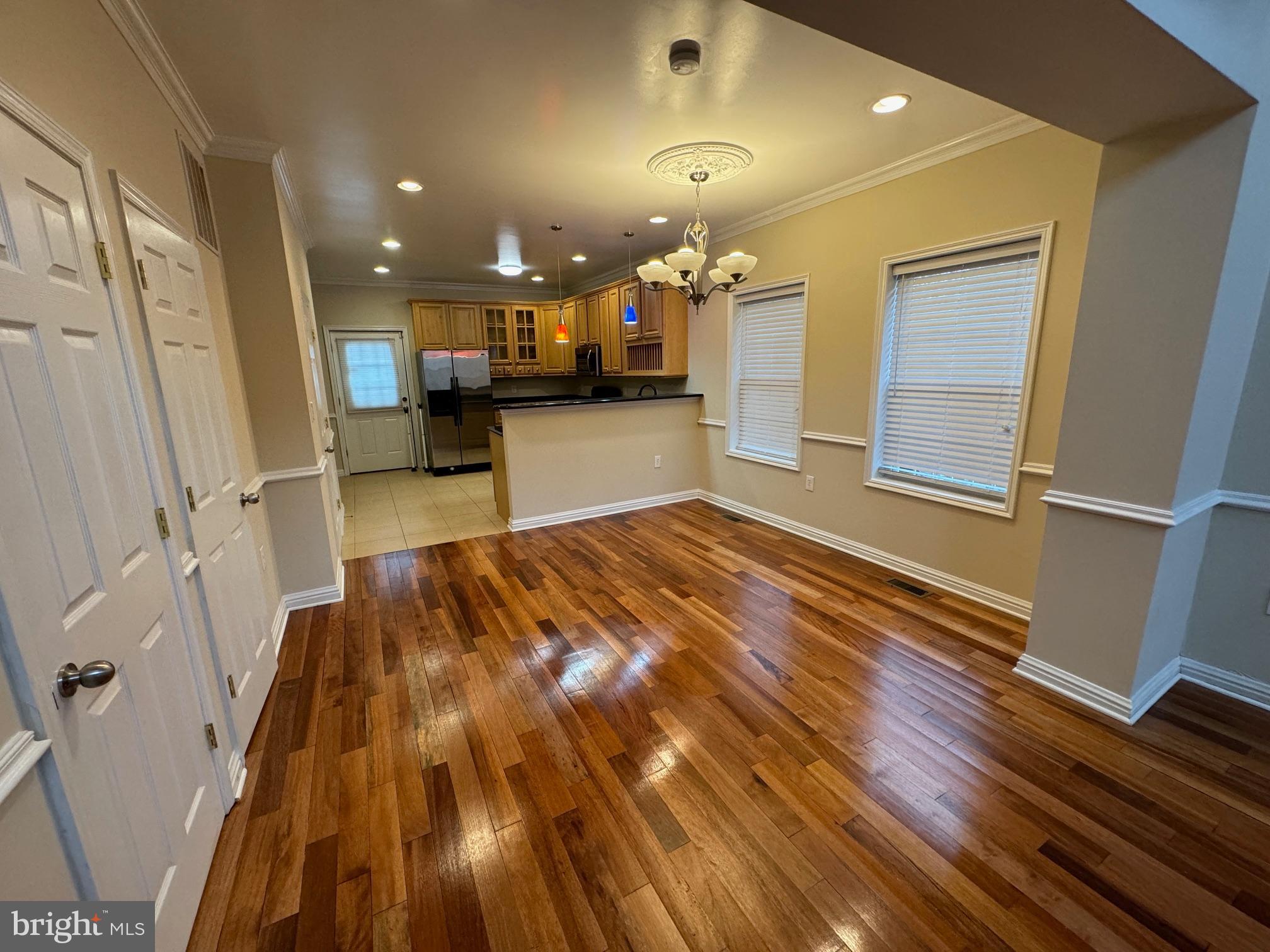 2239 Ridge Place Southeast Washington, DC 20020 - Photo 27 of 44 a view of a room with wooden floor and a window