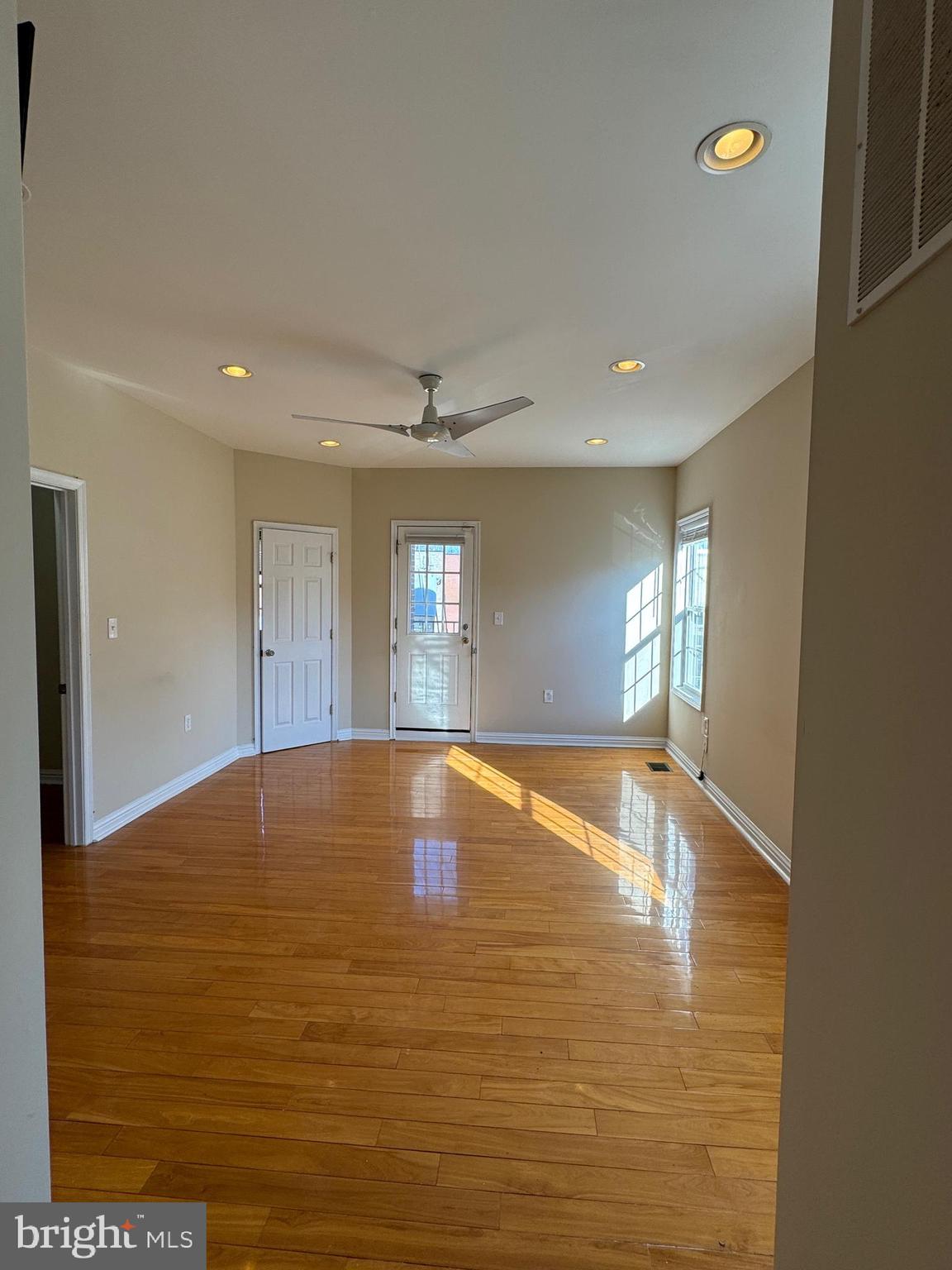2239 Ridge Place Southeast Washington, DC 20020 - Photo 28 of 44 a view of an empty room with window and wooden floor