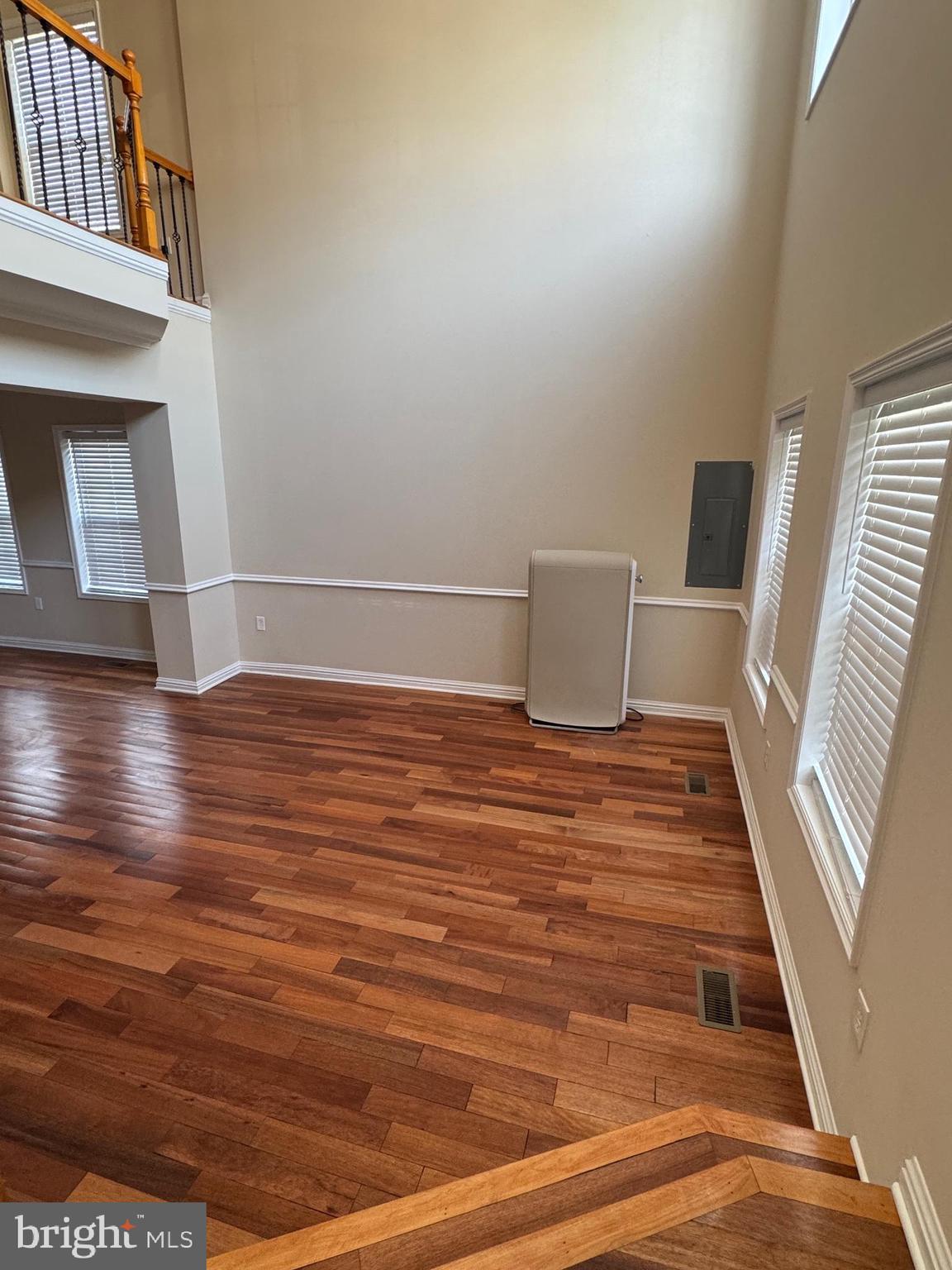2239 Ridge Place Southeast Washington, DC 20020 - Photo 31 of 44 a view of a room with wooden floor and staircase