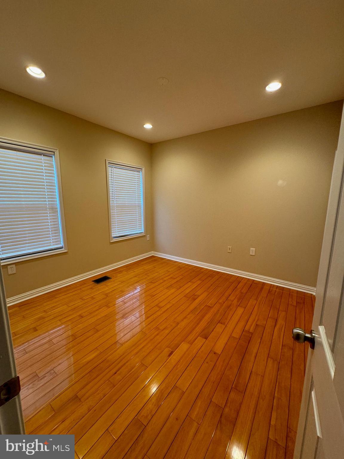 2239 Ridge Place Southeast Washington, DC 20020 - Photo 36 of 44 a view of room with wooden floor and fan