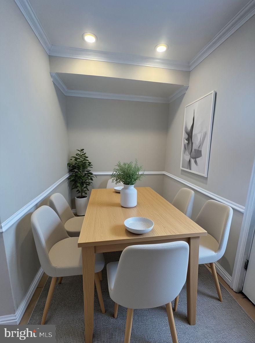 2239 Ridge Place Southeast Washington, DC 20020 - Photo 6 of 44 a dining room with furniture and wooden floor