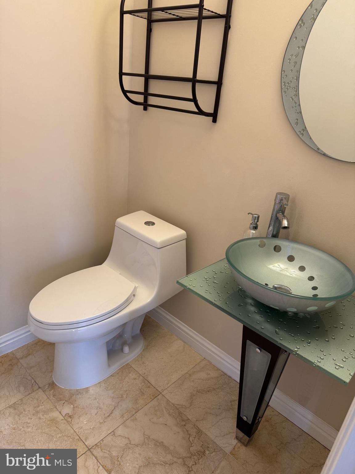 2239 Ridge Place Southeast Washington, DC 20020 - Photo 10 of 44 a bathroom with a toilet sink and mirror