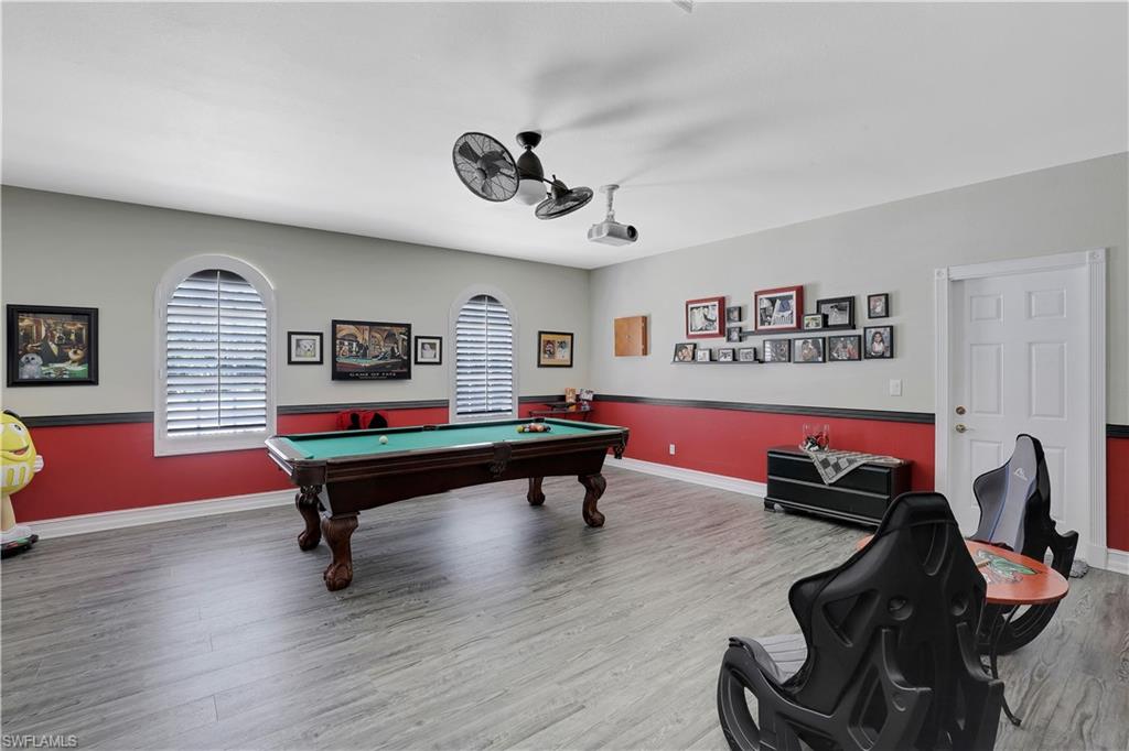 4364 6th Avenue Southeast Naples, FL 34117 - Photo 13 of 35 a room with furniture pool table and window