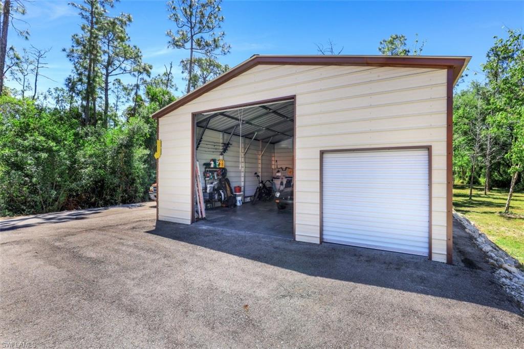 4364 6th Avenue Southeast Naples, FL 34117 - Photo 29 of 35 a view of a house with a outdoor space