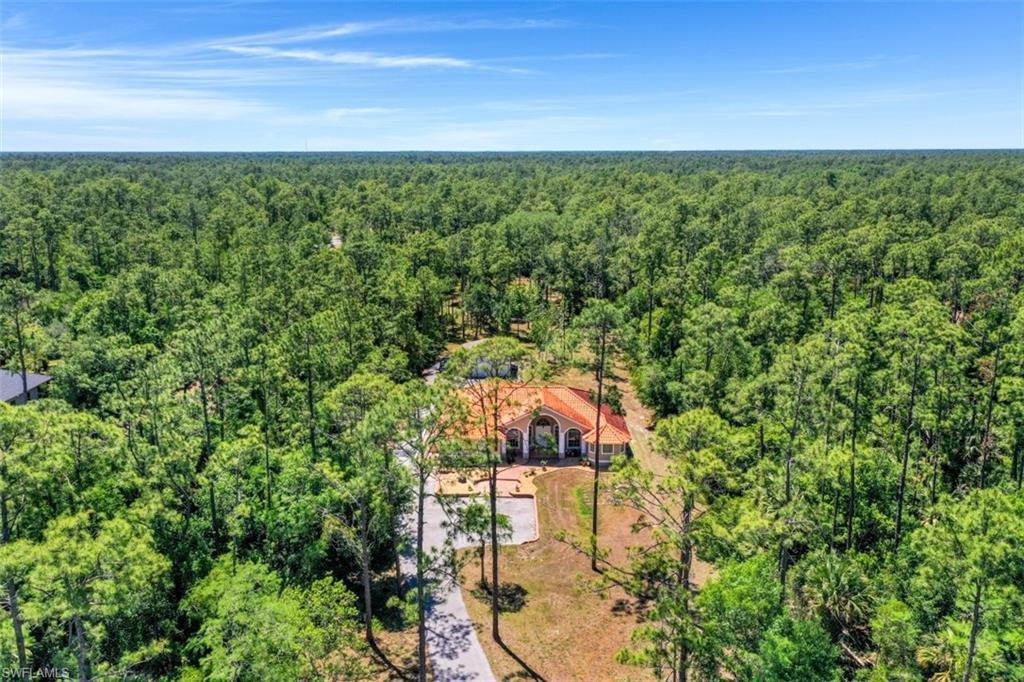 4364 6th Avenue Southeast Naples, FL 34117 - Photo 32 of 35 a aerial view of a house with a yard
