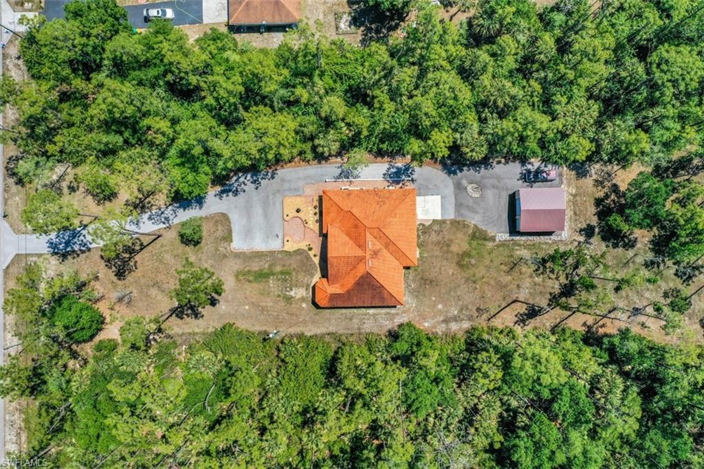 4364 6th Avenue Southeast Naples, FL 34117 - Photo 33 of 35 an aerial view of a house with outdoor space and street view