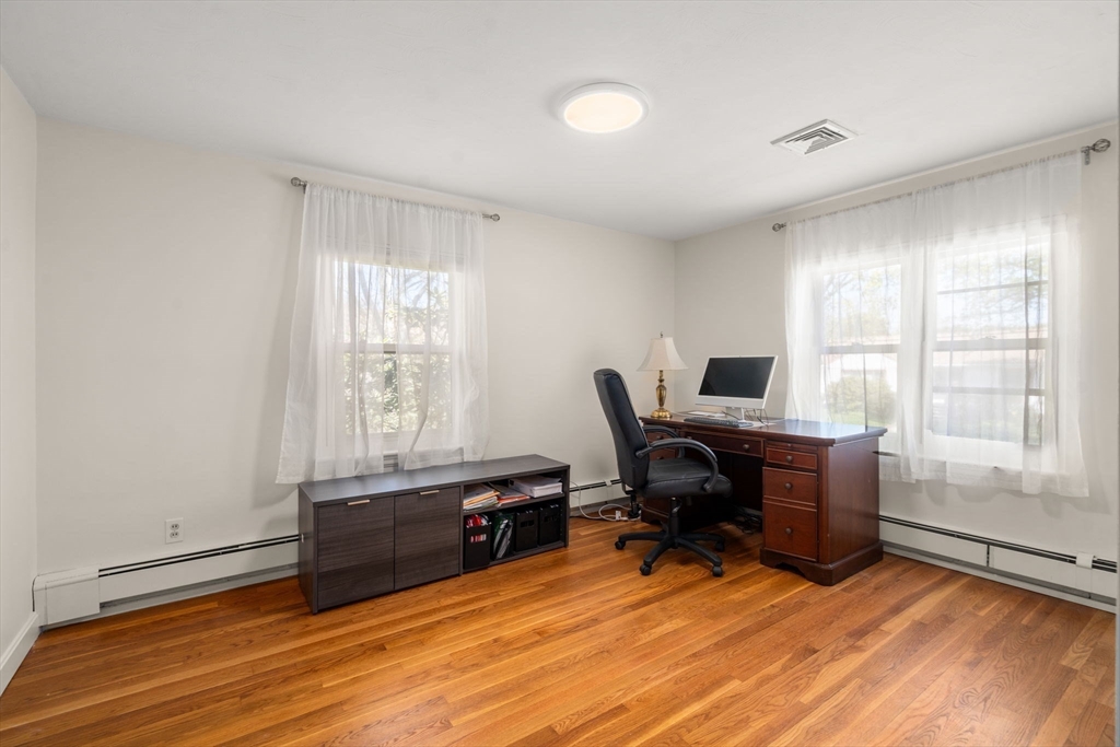 50 Mary Ellen Road Newton, MA 02468 - Photo 12 of 22 a view of a workspace with furniture and a window