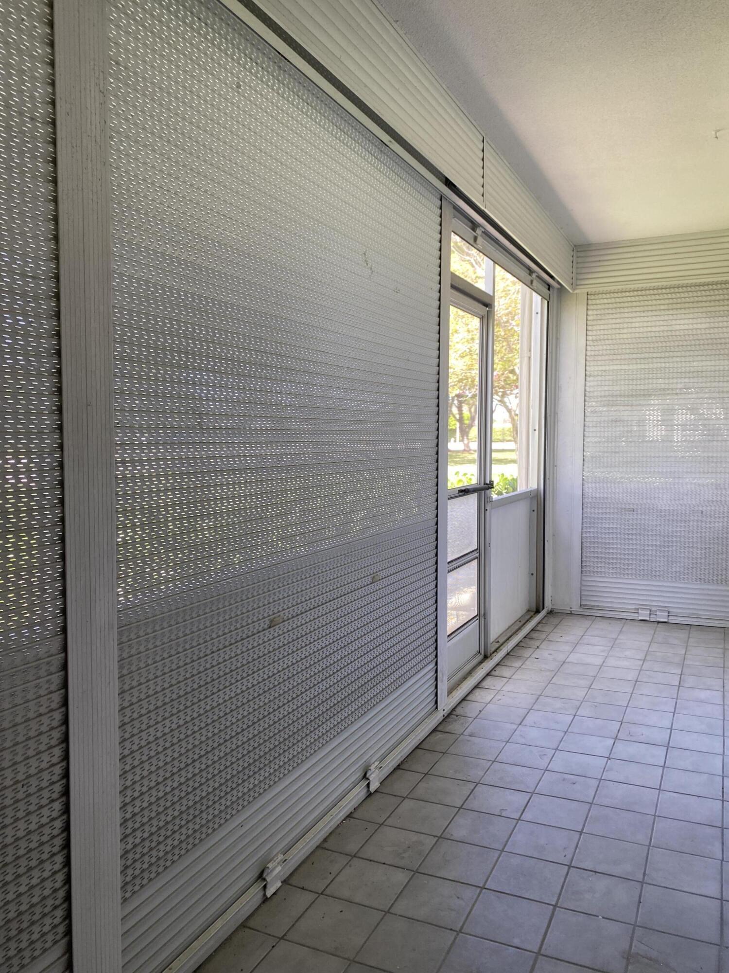 256 Mansfield F, Unit G Boca Raton, FL 33434 - Photo 18 of 40 ROLLADEN SHUTTERS