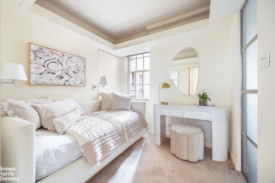 14 East 75th Street, Unit 2/3C Manhattan, NY 10021 - Photo 16 of 17 a bed room with a bed and a painting