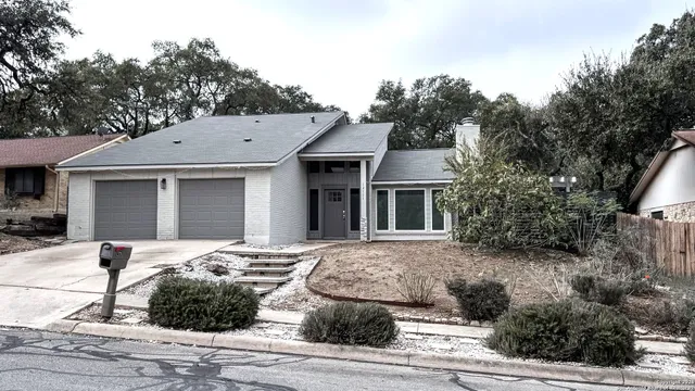 a front view of a house with yard