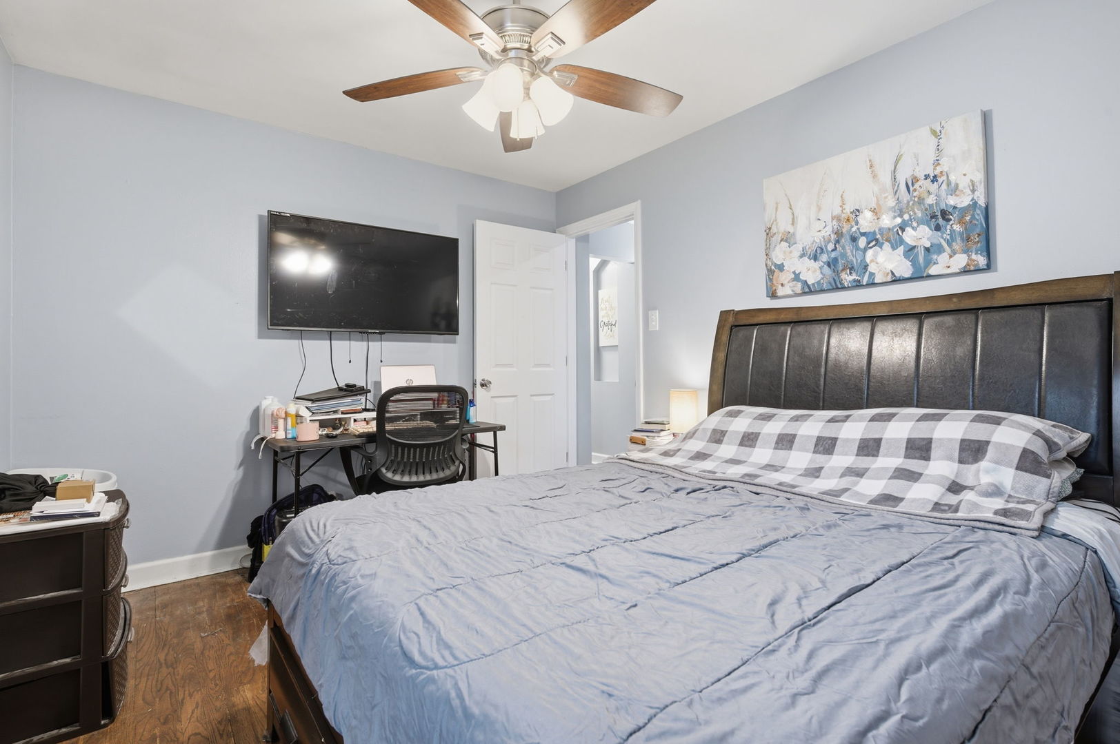 1036 West 105th Street Chicago, IL 60643 - Photo 12 of 30 a bedroom with a bed and a flat screen tv