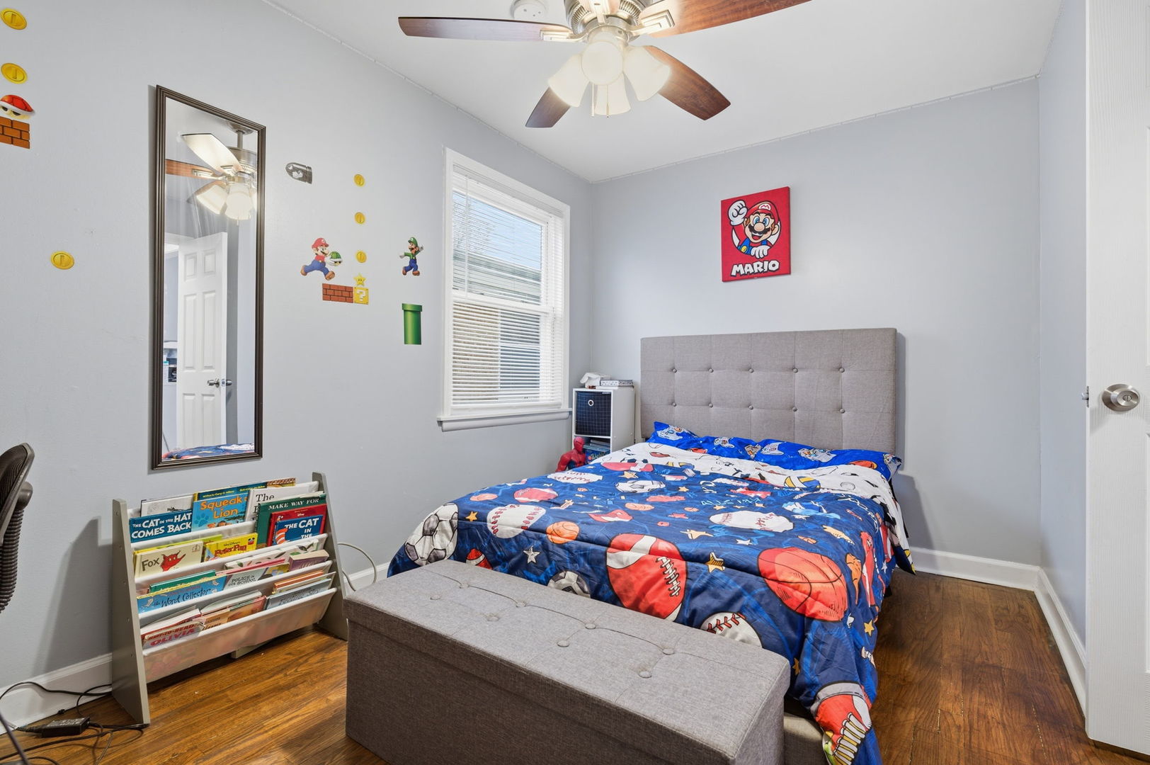 1036 West 105th Street Chicago, IL 60643 - Photo 13 of 30 a bedroom with a bed and a chandelier