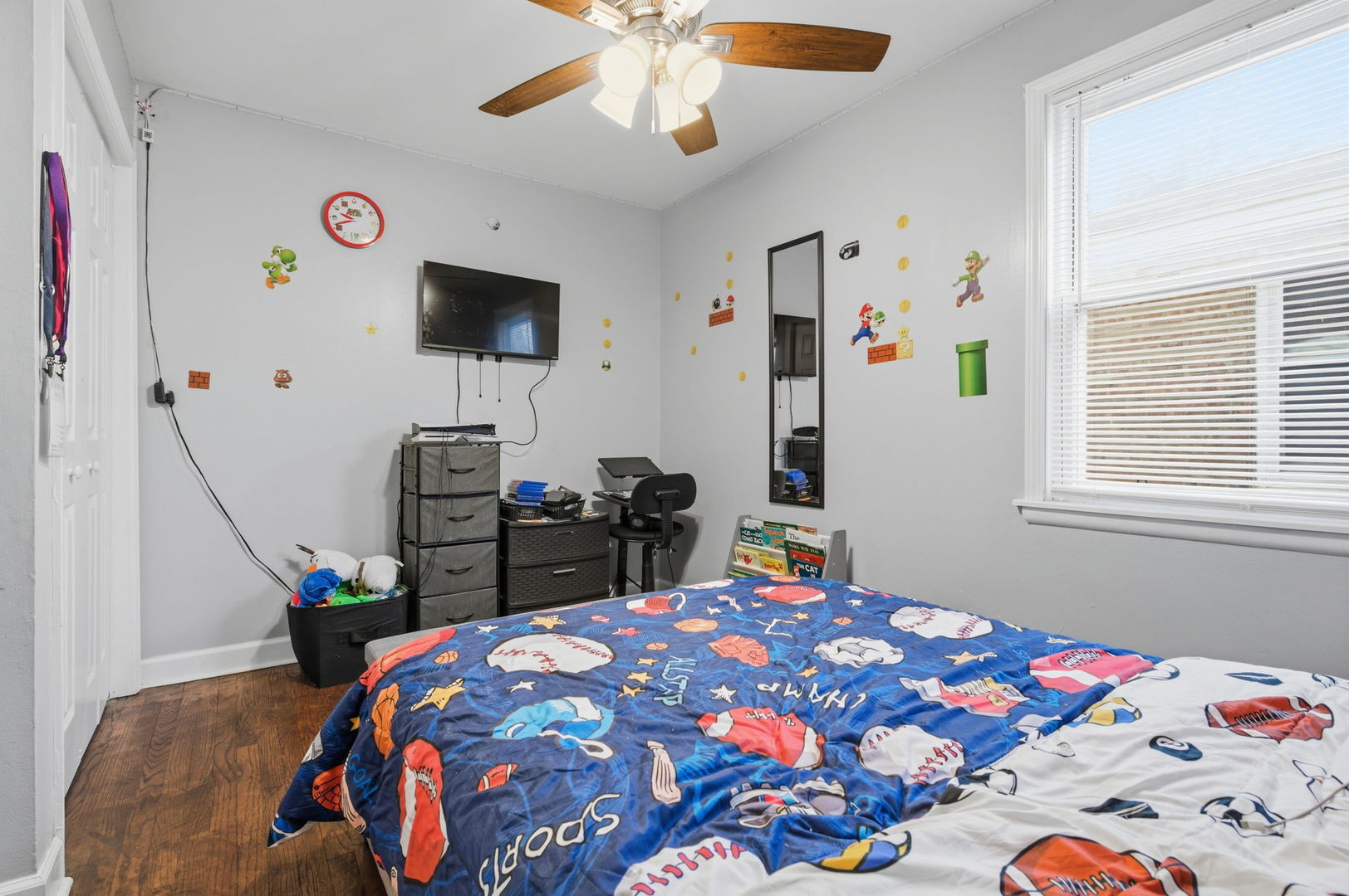 1036 West 105th Street Chicago, IL 60643 - Photo 14 of 30 a bedroom with a bed and a flat screen tv