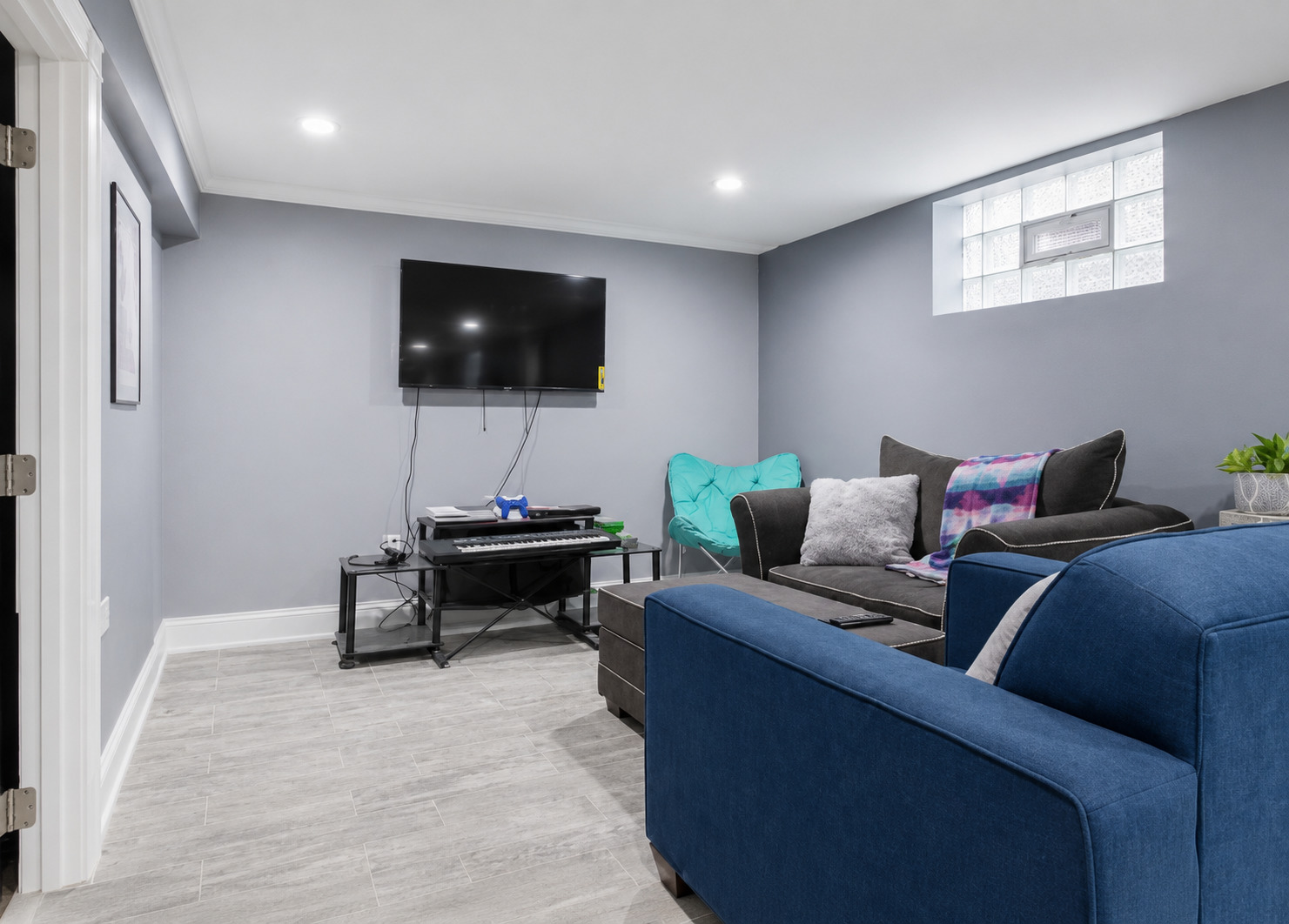 1036 West 105th Street Chicago, IL 60643 - Photo 20 of 30 a living room with furniture and a flat screen tv