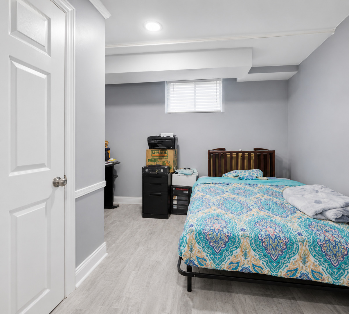 1036 West 105th Street Chicago, IL 60643 - Photo 22 of 30 a bedroom with a bed and wooden floor